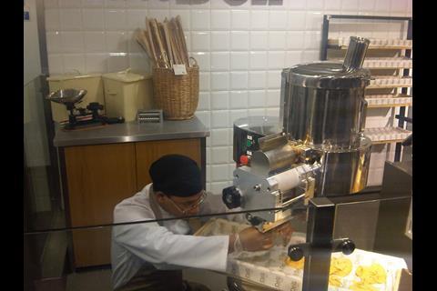 Making fresh pasta in the deli at M&S in Kensington